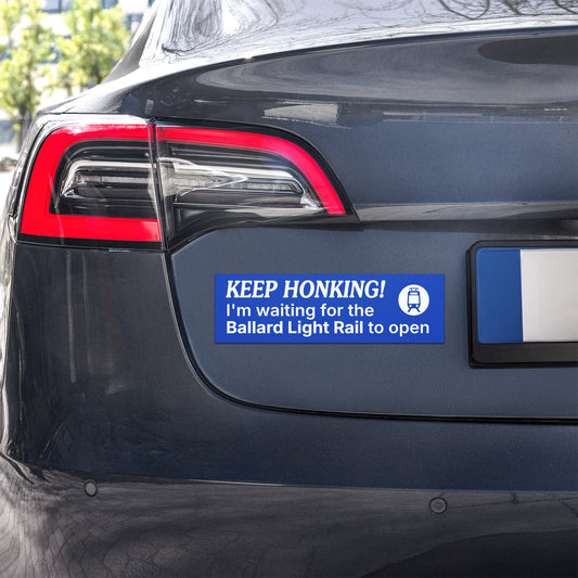 Keep honking! I'm waiting for the Ballard Light Rail to open blue car magnet