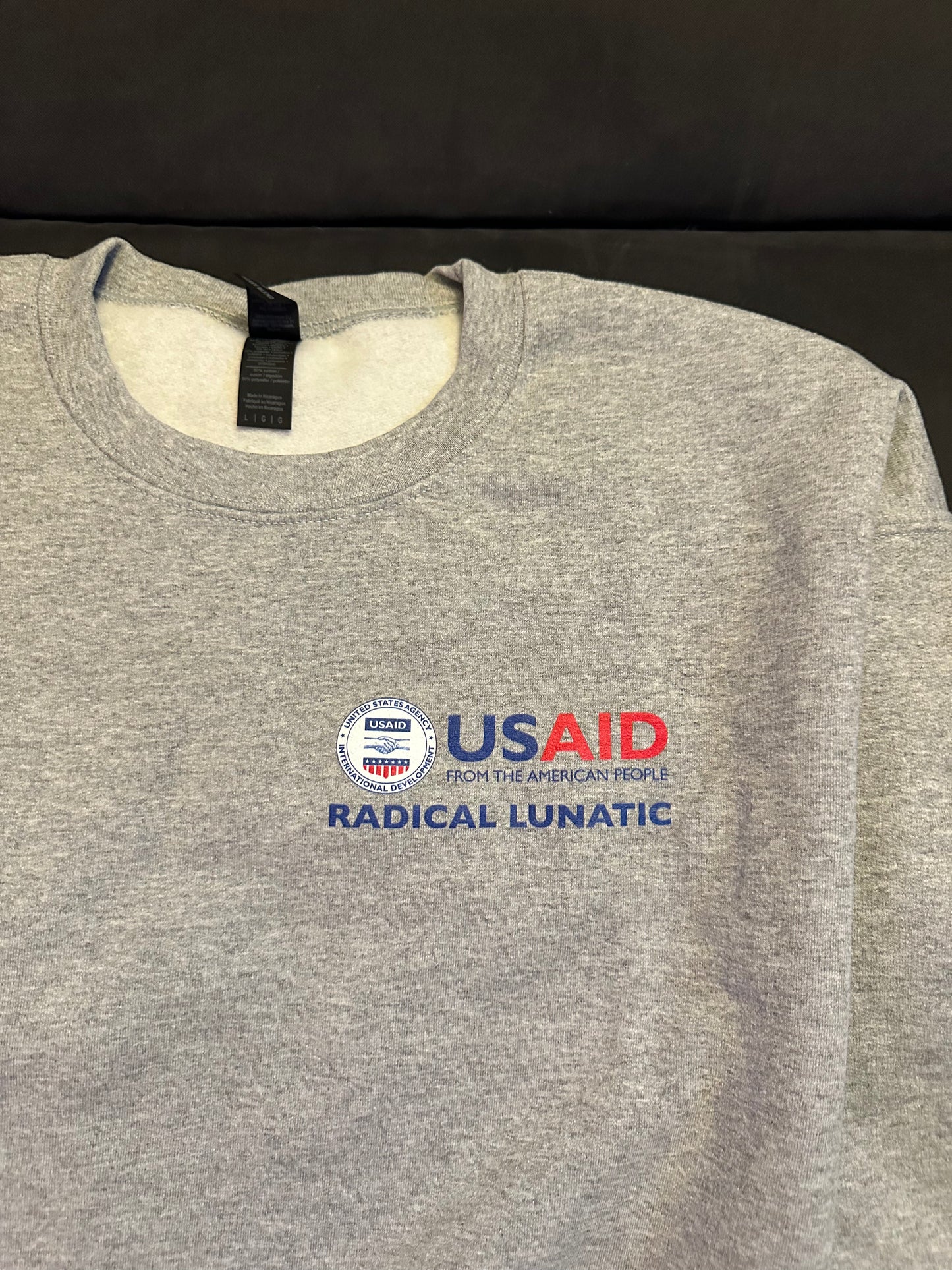 Support USAID Radical Lunatic crewneck sweatshirt