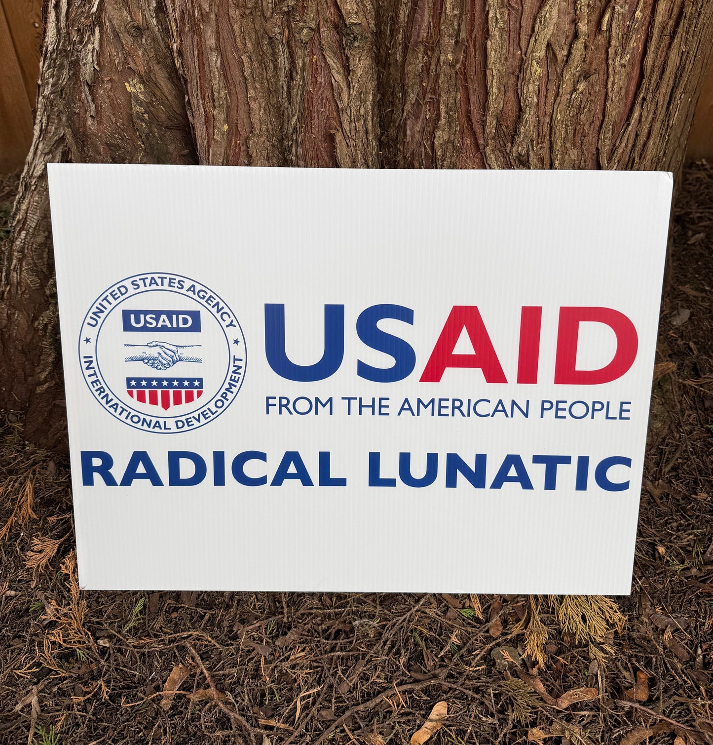 USAID Radical Lunatic yard sign